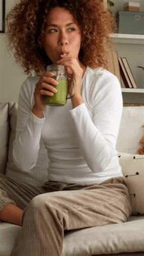 clip-3987443165-beautiful-african-american-woman-curly-hair-relaxing