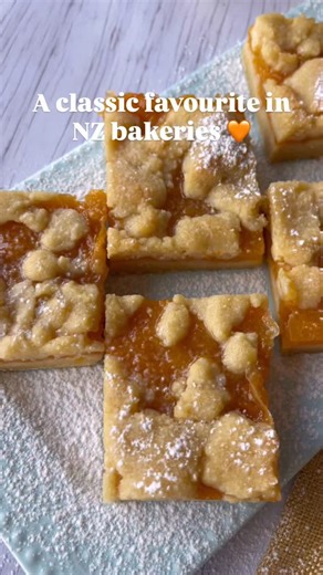 8.7K views · 282 reactions | A baked fruit slice made from a buttery vanilla base layered with cooked apricots and a crumble topping. A lovely treat for morning tea or serve warm as a dessert. Here’s the recipe so you can recreate this at home! https://vjcooks.com/baked-apricot-slice/ | VJ cooks | Facebook