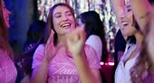 Bachelorette party, dance and smile with friends of bride in...