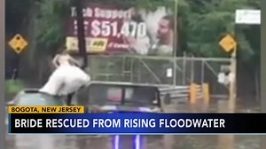 New Jersey bride rescued from flood waters