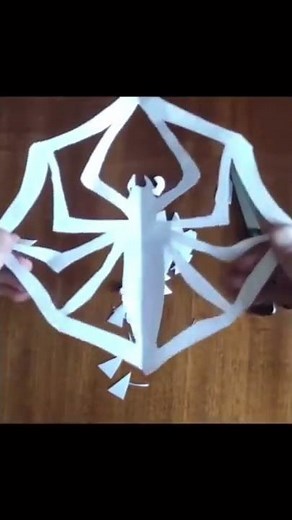 How to make spider man logo on paper cut