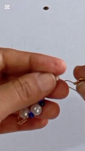 earrings #easydiy #earrings materials: 1. blue Cristal beads 3mm 2. pearl beads 7mm&pearl beads 3mm 3; golden round beads 2mm 4. beading needles #11 & thread 5. clasp & scissor 👉 threads length 120cm earrings Handmade Easy Diy #2025reels #viralreels #fypreels #reelsviral #foryoupage #shortvideo #video #StarsEverywhere #handmade #videoviral #fbyシvideo #fbpost2025シ #fbreelsfypシ゚viralシ #foryouシpage #foryoupagereels #foryoupageシforyou #followersreelsfypシ゚viralシfypシ゚viralシal #followersreelsfypシ゚vira