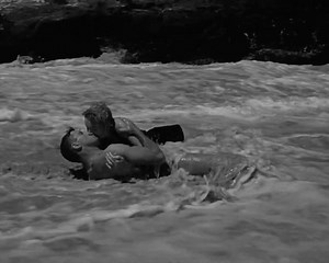 Deborah Kerr and Burt Lancaster in From Here To Eterntiy, 1953 The now classic scene between Burt Lancaster and Deborah Kerr in the rushing water on the beach was not written to take place there. The idea to film with the waves hitting them was a last-minute inspiration from director Fred Zinnemann. | Old Movies