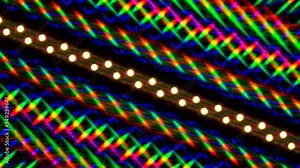 Game of bright color highlights. Beautiful bright and multi-color image of light diffraction from a rotating line of LEDs. Double diffraction grating used Stock Video
