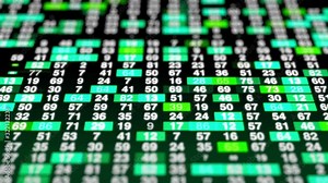 Computer monitor showing live trading of stocks and shares with most stocks in the green.