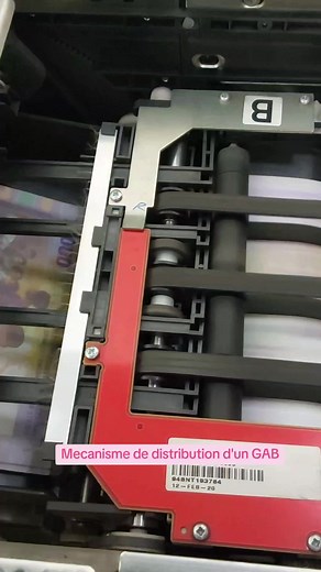 Mécanisme de distribution d'un Guichet automatique de banque