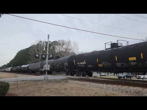 CSX Heritage unit Family lines system 1972 lead train M494 with am ex BNSF GP15