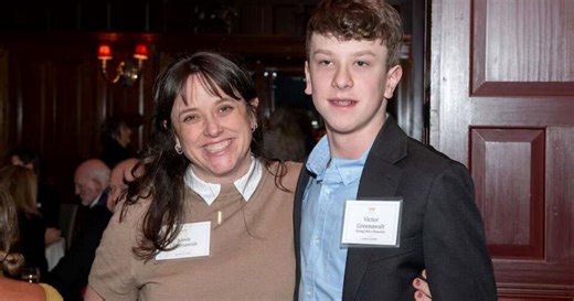 Boy receiving Citizen Honor Award for shielding classmate during school shooting in Minneapolis