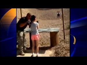 Girl shoots instructor