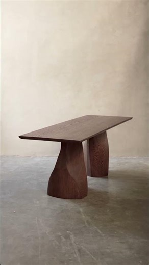 The Solace console table uses asymmetry to create equilibrium rather than perfect alignment.