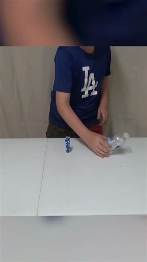 Cap Flip On 4 Stacked Dice #shorts #trickshot #challenge