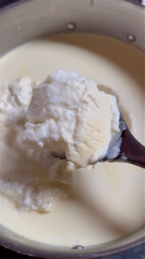 Baked. Milk. Yogurt Ryazhenka, Russian cultured milk is prepared by fermenting milk after it was baked at low oven temperature for 6-8 hours. During that time, some of the water evaporates, and Maillard reaction occurs between amino acids and sugar, which gives milk light brown tint and wonderful caramel-like flavor. Traditionally, sour cream is used to trigger the fermentation, but you can also use kefir or buttermilk as well. Sour cream cultures give it a creamier, more yogurt-like consistency