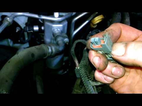 Fuel injector connectors 2006 GMC Yukon Chevrolet close up