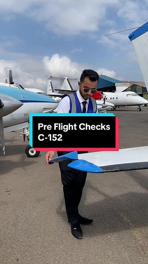 Pre flight checks on the Cessna 152 training aircraft.