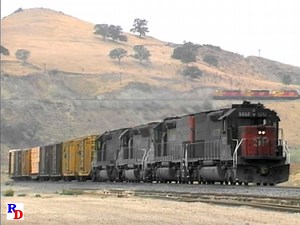 89K views · 9.1K reactions | As a Southern Pacific freight arrives at Caliente, California, a Santa Fe train with a "Kodachrome" 3-pack rolls downgrade. From the WB Video Productions show on 2 discs "Tehachapi - 1988" https://rfd.video/T1988 | Railfan Depot | Facebook