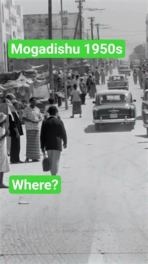 Can You Spot The Moving Cars in This Busy 1959s Mogadishu Market Street?
