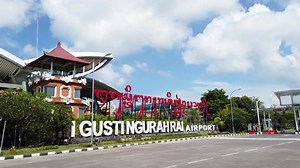 Kuta , Bali , Indonesia - 11 07 2021: I Gusti Ngurah Rai International Airport Kuta Bali open for tourists with Signage Billboard and Clear Blue Sky