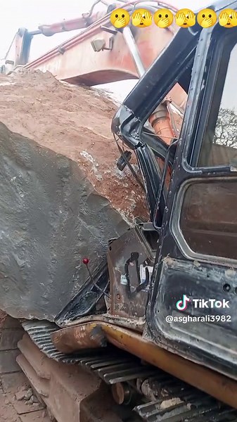 Yellow Hitachi Excavator in Action at Construction Site
