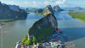 floating fishing village at Koh Panyee, flying above a famous destination in Phang Nga Bay, Thailand, floating muslim fishing village in Thailand