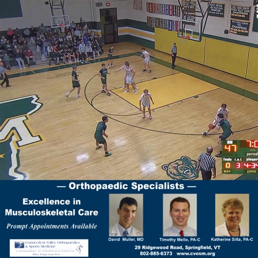 Springfield's Ollie Kelley spins away from the defense for 2 of his 23 points against Green Mountain. | Springfield Area Sports Page