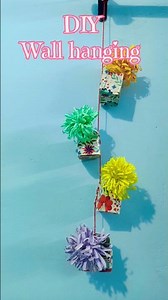 Simple wall hanging from waste material #shortsvideo #wallhangingcraftdecor #simple #wastematerial