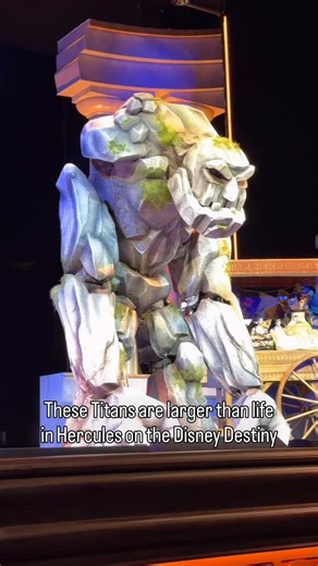Jake Krol on Instagram: "This was awesome — here’s a closeup look at the Titans in #Hercules on #DisneyDestiny! These are made from a bunch of materials including carbon fiber and weigh over 100 pounds, so an #exoskeleton is used. So neat. #disneycruise #disneycruiseline"
