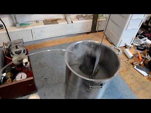 Fluidized bed powder coating a small bracket