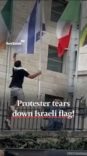 9.3K views · 172 reactions | A young protester in Rome, Italy, was seen forcefully tearing down the Israeli flag. A security guard attempted to intervene, but the protester succeeded in removing the flag. #Palestine #Italy #Rome #Protester #Flag #Israel #Security #Tension #Incident #Demonstration #FlagRemoval #Unrest | Yeni Şafak | Facebook