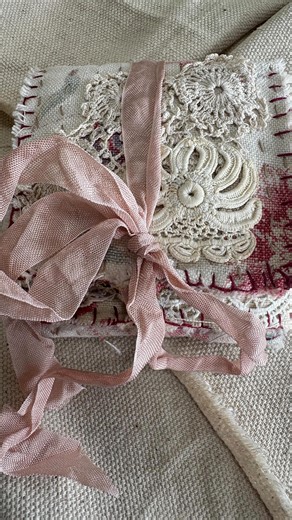 Eleanor & Ruby - Leisa on Instagram: "Rainy days at the beach…. My treasure pocket came together and I love her. Inspiration from @madamedubocage and @roxycreationsbyrachel Once I’m home I will probably add a few more treasures but I’m excited with the results of this little pocket. @roxycreationsbyrachel was absolutely right in saying how lovely they are to create and to just hold and admire. #eleanorandruby #slowstitching #pocketreasure #vintagefrench #vintagelace"