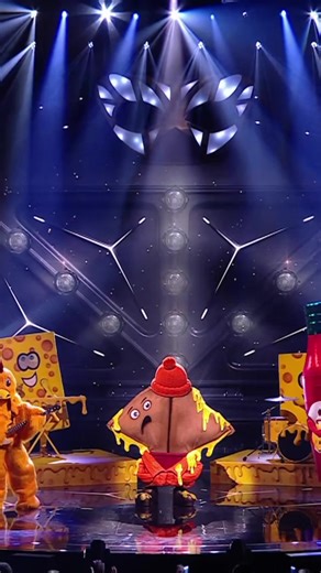 Unmasking the Voice: Who Sings Behind the Mask?