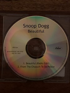 Snoop Dogg Feat. Pharrell Feat. Uncle Charlie Wilson - Beautiful