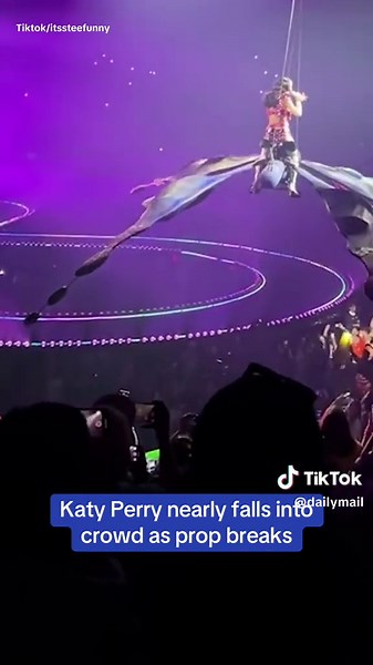 Katy Perry nearly falls into crowd as prop breaks during concert
