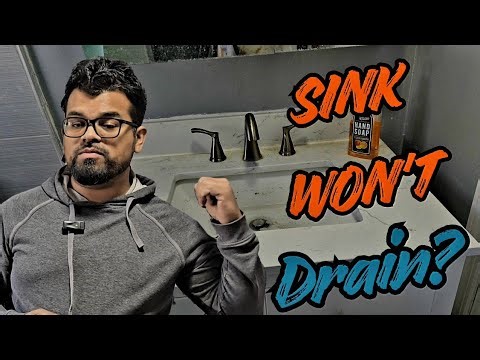 How to Clear a Clogged Bathroom Sink (Hand Snake Method)