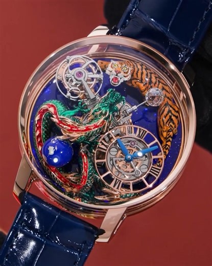 JACOB & CO. on Instagram: "Astronomia Dragon & Tiger brings two legendary forces into perfect tension. The dragon coils in solid rose gold, sculpted by hand and alive with expression, while the tiger embodies power, balance, and vigilance. Wrapped around the vertical architecture of Caliber JCAM25, each element becomes part of the movement itself—art, mechanics, and symbolism intertwined in three dimensions. A rare expression of high watchmaking, high jewelry, and myth brought to life. 47-mm ros