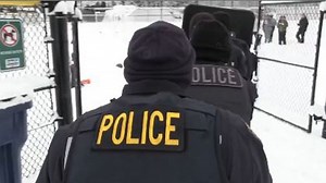 Watch police and kids have epic snowball fight