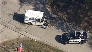 SkyEye video shows postal truck damaged after crashing at north Houston intersection