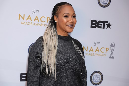 Erica Campbell responds to being labeled a 'harlot' over 2013 photo in tight dress