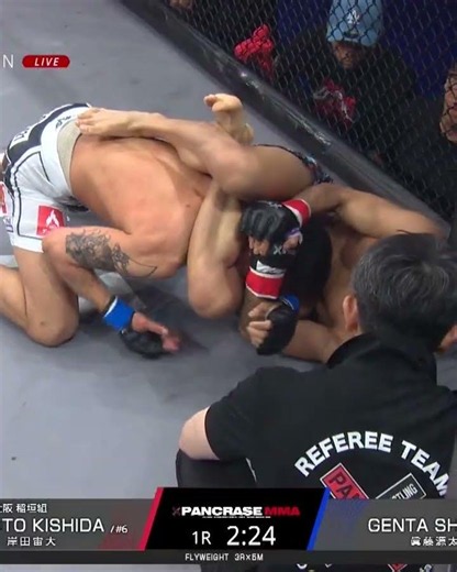 Hiroki Kishida finishes the match with his signature grappling techniques, setting him up for the...