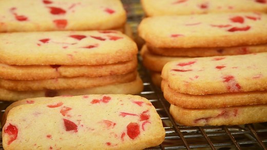 Link to recipe: https://www.joyofbaking.com/IceboxCookies.html One look at this stack of sweet and buttery Icebox Cookies, dotted with flecks of red candied cherries, makes you think of Christmas. There is no doubt as to why these old fashioned refrigerator cookies have remained a favorite. They taste great plus you can make the dough ahead of time and then simply slice and bake the cookies as needed. What a treat it would be during the holiday season, to give a busy friend a nicely wrapped froz