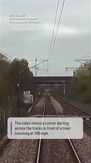 Runner Darts in Front of Train