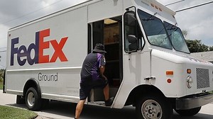 FedEx Overhaul Contemplates a Future With No Drivers on Payroll