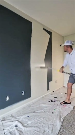Beige Paint Rolled Over a Dark Blue Wall: Satisfying Room Refresh 🎨🧱