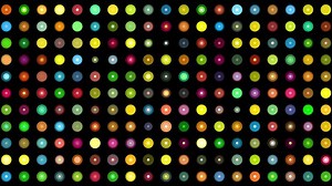 glowing colorful dots on black background
