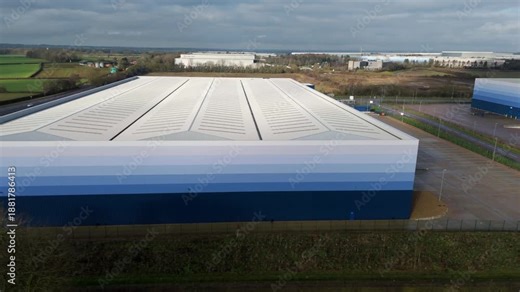 Detailed aerial perspective of new build ombre clad industrial warehouses at Magna Park United Kingdom