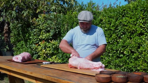 Whole beef leg wrapped in salt and roasted