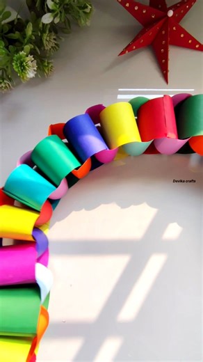 Devika crafts✨ on Instagram: "Colorful paper chains 💖✨ Colorful Christmas DIY & such an easy Christmas craft 🎄✨ #diy #christmas #christmasgarland #trending #christmastime #colorfulchristmas #handmade #christmascrafts #explore #viral #reels #passion__for__craft__ #instagood #papercraft #holidaydiy #explorepage"