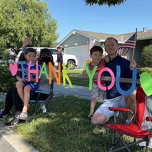 This neighborhood decorated the streets with American flags and posters thanking all essential workers! | Localish