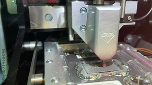 Automatic engraving on iron or metal for pets tags. CNC Laser cutting of metal, modern industrial technology