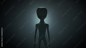 3D CGI VFX animation of a classic Roswell style grey alien on a dark backlit background, standing and looking menacingly into the camera, with a smokey, atmospheric environment Stock Video