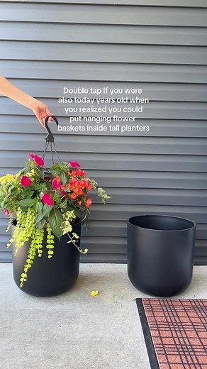 This was SO easy and these beautifulllll hanging flower baskets fit perfectly inside our tall planters! LOVEEEE 🌸🍊🌷🌼 #springplanting #flowerbasket #frontporch #frontporchdecor #flowerarrangements #outdoorflowers #frontporchliving #springrefresh #summerporch #frontporchflowerpots #frontporchstyling #plantingflowers #summerrefresh #pottedplants #pottedplant #tiktokhacks